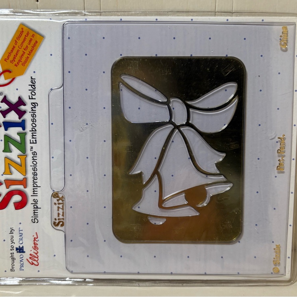 Sizzix Silver Embossing Folder with Bow Design